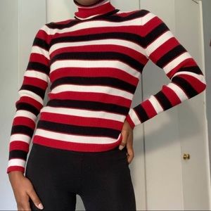 Red, white, and black striped turtleneck
